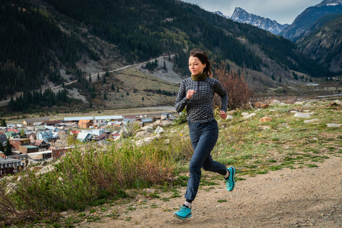 woman running with baselayer