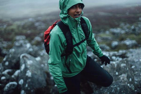 Woman hiking with hiking gear