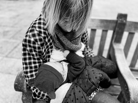 Stylish Mum Breastfeeding in public