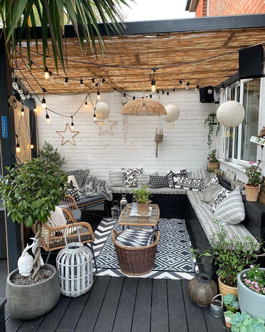 Relaxed, chill out area inspiration for outdoor entertaining with pergola and pallet seating