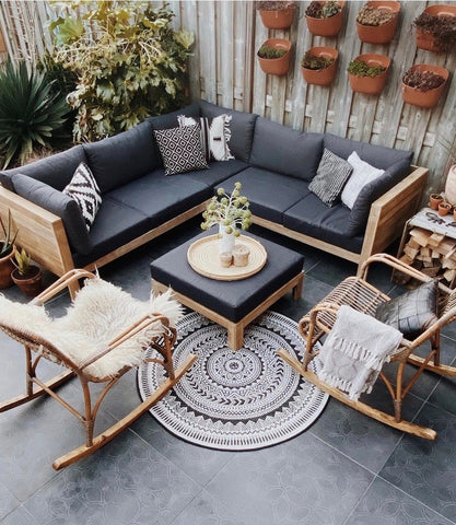 Minimalist, natural outdoor decor. Calm and tranquil seating area with stylish furniture