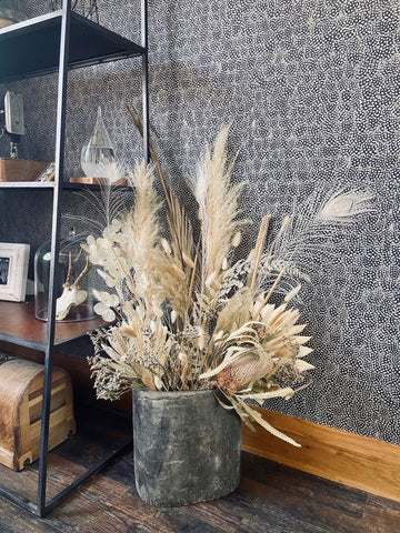 Neutral dried flower arrangement with dried palms and pampas grass