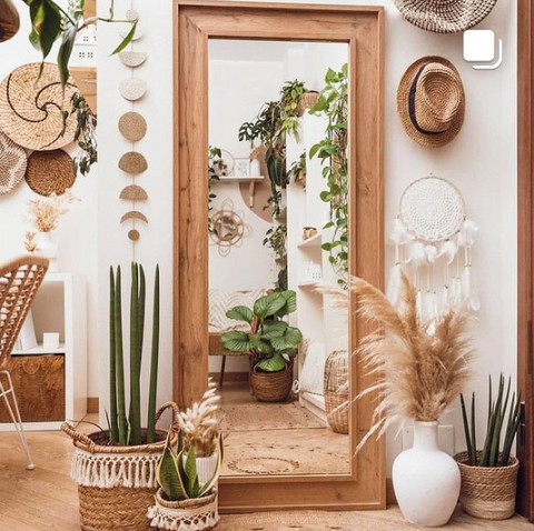Desert inspired bohemian interior with cacti and pampas grass accents