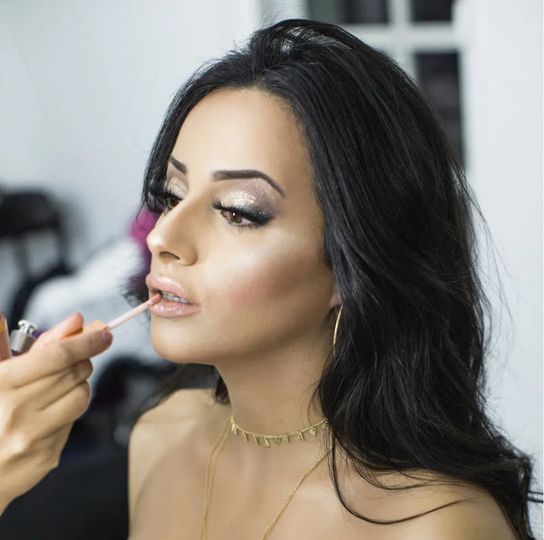 Swati Verma applying lipstick on a client regarding different makeup type