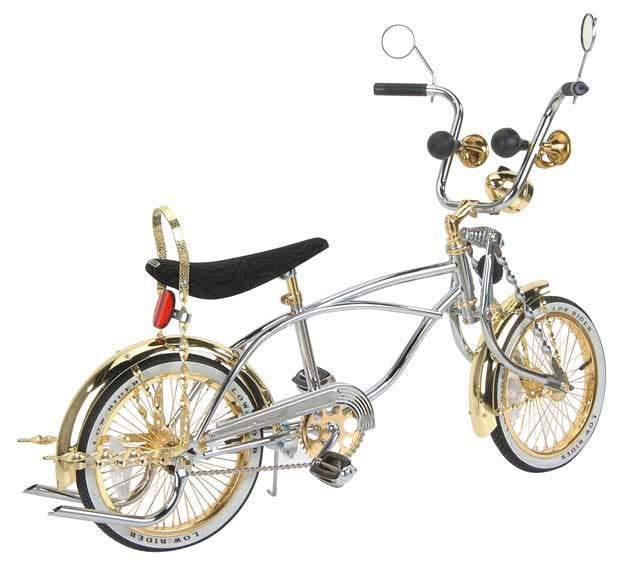 chrome and gold lowrider bike