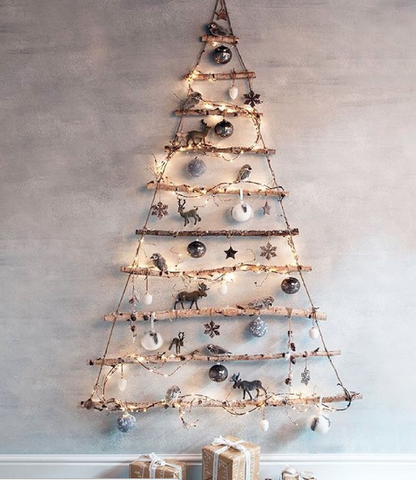 Driftwood Christmas Tree DIY - a sweet and sustainable Christmas tree option for the wall! #christmastrees #diychristmastree #driftwood #coastalchristmas #christmascraft