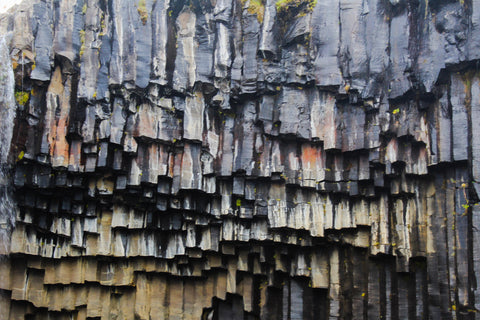 black basalt columns of Svartifoss waterfall in Iceland