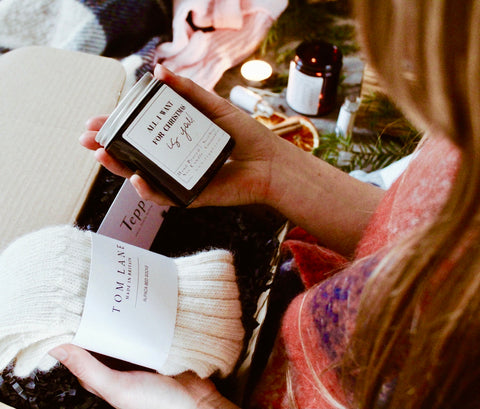 woman opening a gift box