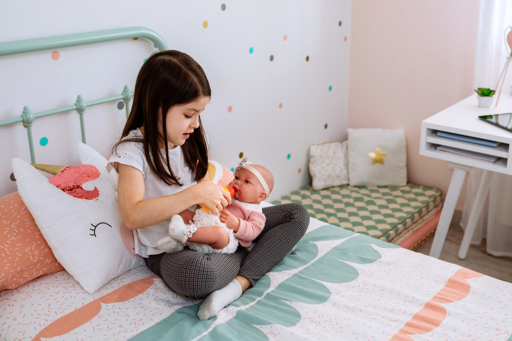 Childhood is a crucial period for developing emotional intelligence – the ability to recognize, understand, and manage one's own emotions, as well as empathize with the emotions of others. In this blog post, we will explore the remarkable role that baby dolls play in nurturing emotional intelligence among young children through the magic of pretend play. From fostering empathy to cultivating compassion, baby dolls offer a delightful pathway for kids to grow emotionally while having fun.