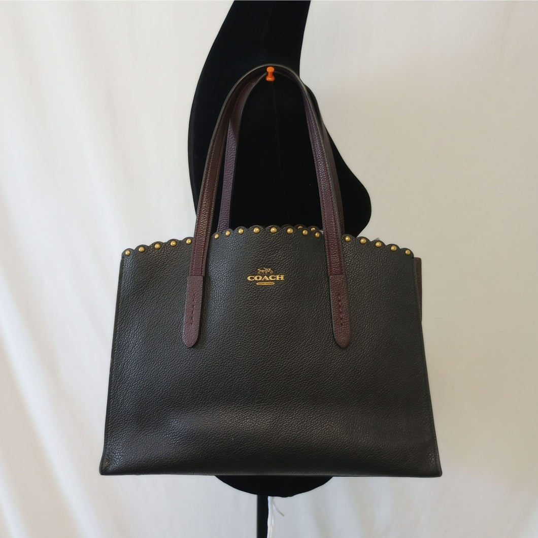 coach charlie scallop rivets carryall bag