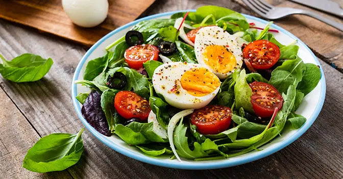 Healthy salad with hard boiled eggs