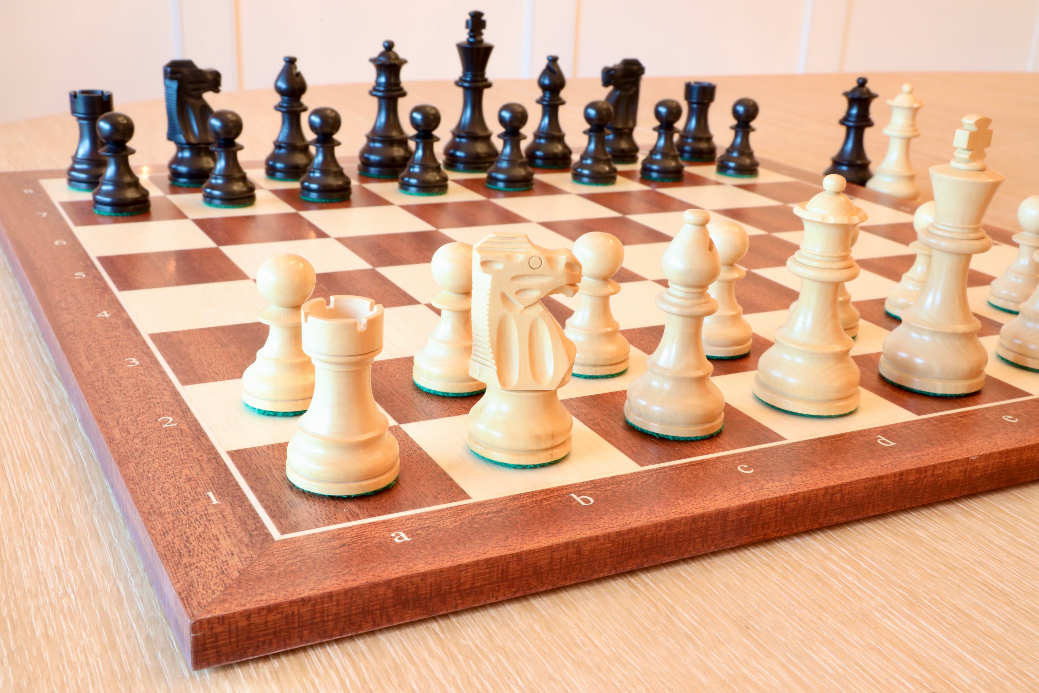 The Queen's Gambit Final Game Chess Set Ebonized & Boxwood Pieces with Queen's  Gambit Board - 4 King - The Chess Store