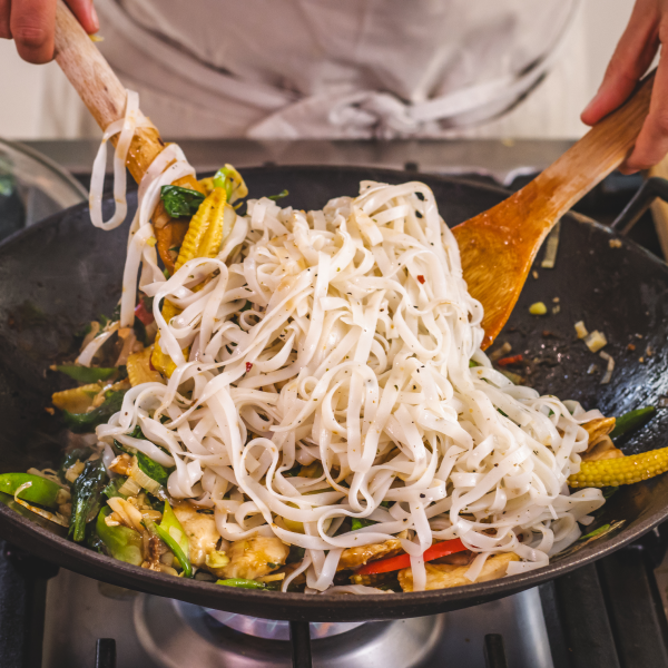 Toss chicken, vegetables and noodles