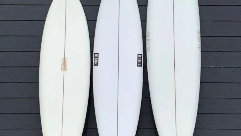 Lineup of Album Surfboards.