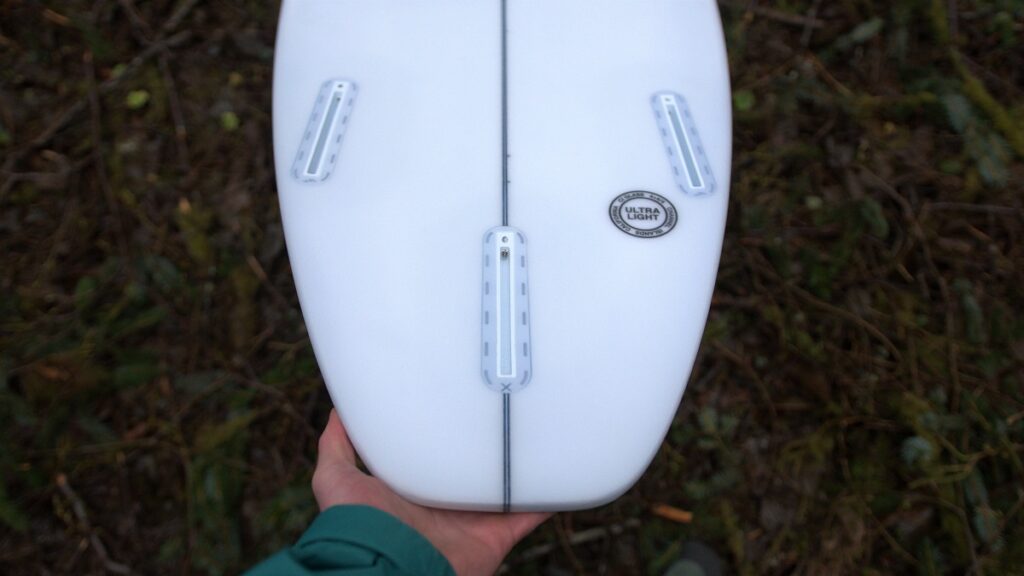 Channel Islands CI Pro Surfboard detailed look at the fin boxes.