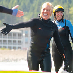 Lexie Hallahan Surf Instructor Reaching Out For A High Five