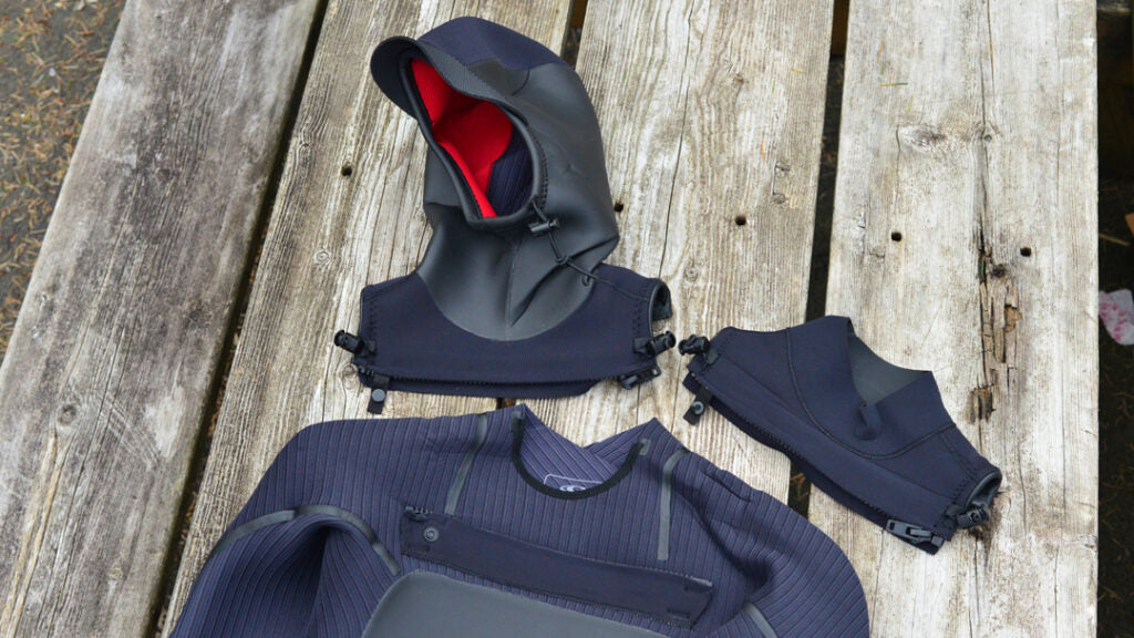 O'Neill Mutant Legend wetsuit with the two separate attachments: the neck piece and the hood piece.