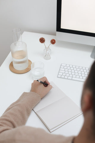 Photo by Cup of  Couple: https://www.pexels.com/photo/crop-man-writing-notes-while-working-in-office-6177572/