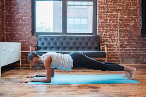 Photo by Klaus Nielsen: https://www.pexels.com/photo/woman-planking-on-a-yoga-mat-6303467/