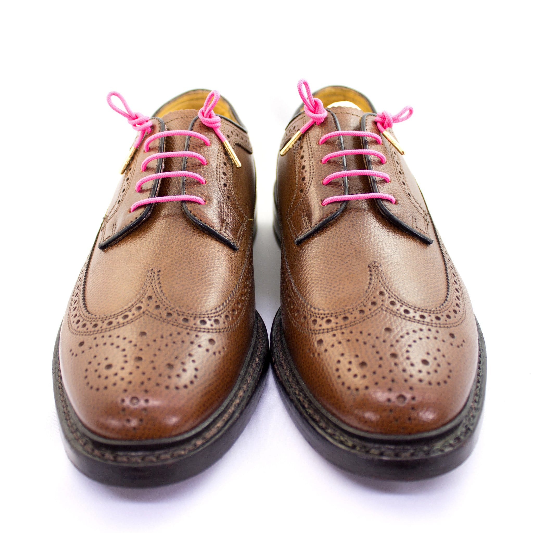 tan shoes with pink shoelaces