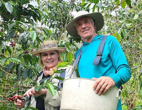Steve and Joanie Wynn in coffee field
