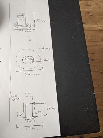 A technical sketch which later became the Alice bottle top, including measurements.