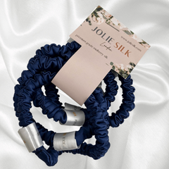 Jolie Silk Mulberry SIlk Glide HAirdbands in French NAvy.  Silk Scrunchies Silk Hair Ties Strong Hold Hair Elastic Ponytail Holder Hair Ties . pile of skinny scrunchies. Emerald, Navy Onyx, Light Grey, Cream