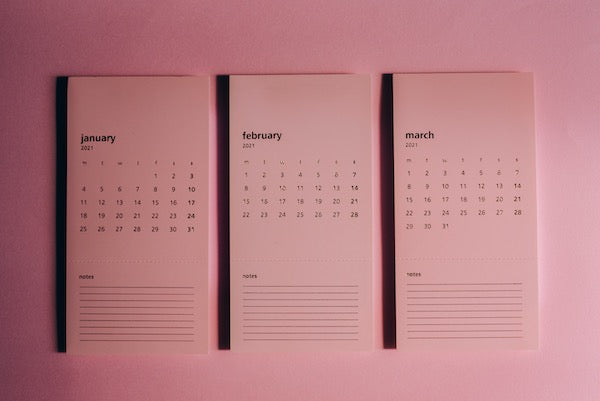 Pink calender with 3 months printed