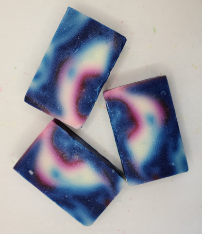 Cold process soap in navy, pink and white swirls