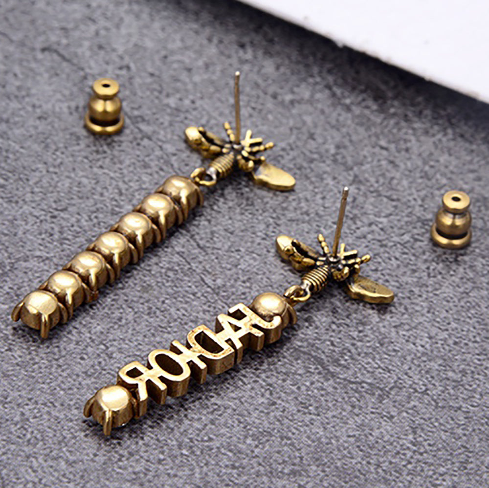 Christian Dior new bee letter stud earrings with diamond stud ea