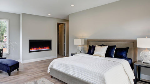 50" Allusion Platinum Recessed Linear Electric Fireplace in bedroom.