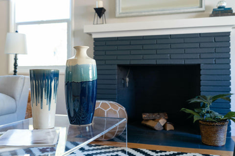 Brick fireplace painted blue.