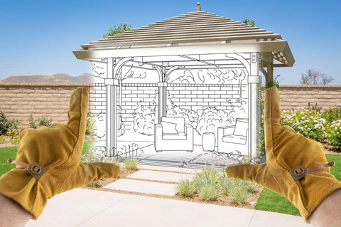 Contractor hands framing drawing section of custom pergola patio cover design drawing