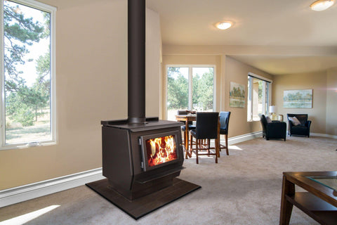 Modern wood burning stove inside cozy living room