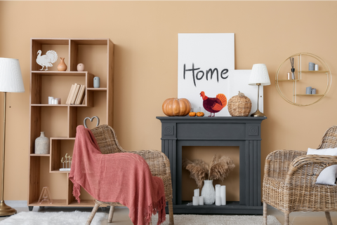 Turkey decorations on a mantel with beige wall paint.