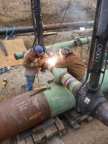 Welders are pipeline welding