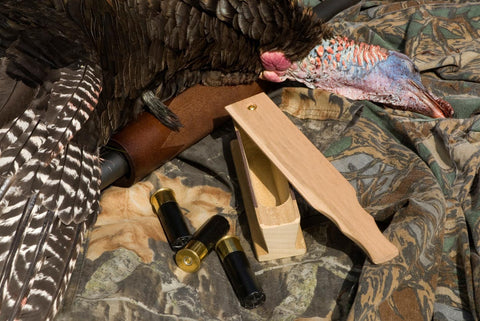 Turkey carcass, turkey call and shotguns shells