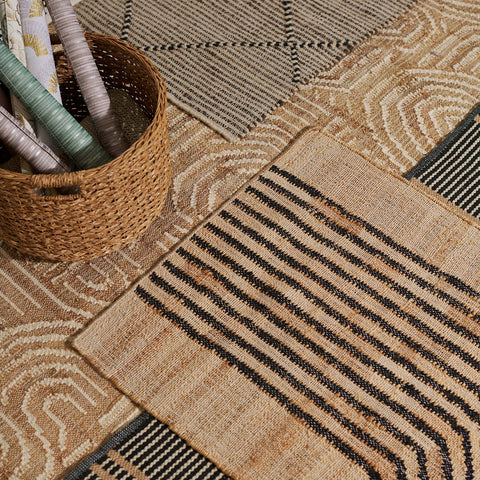 Neutral-colored rugs from Tempaper & Co.