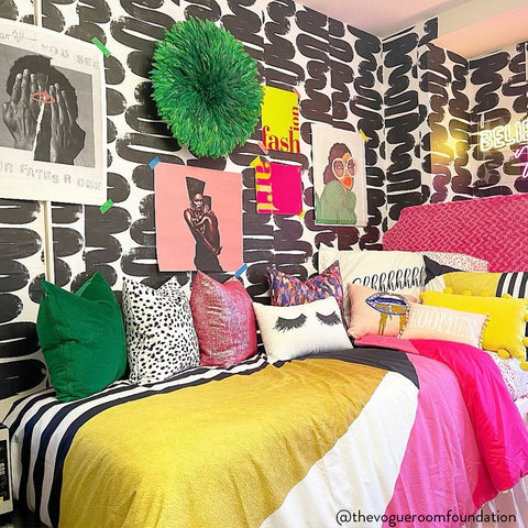 Dorm room with Wiggle Room Tempaper on wall behind bed. Image from @thevogueroomfoundation