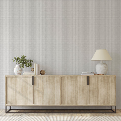 Textured Batik Stripe wallpaper in an entryway with a modern console