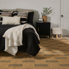 double dash indoor/outdoor reversible rug in a bedroom
