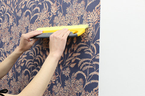 Step 6 Unpasted Wallpaper Application: Smooth Your Panels with a squeegee