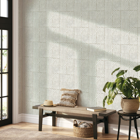 Tile Block peel and stick wallpaper on the wall of an entryway with a bench and plant.