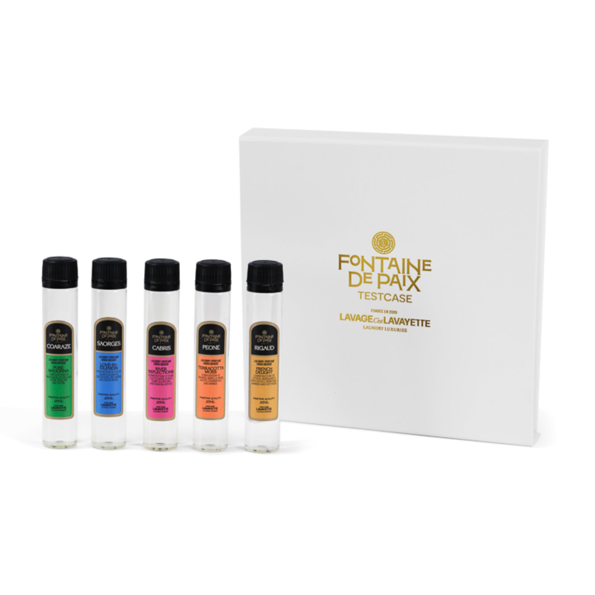 Set of five perfume vials with a white box labeled 'Fontaine de Paix Testcase.'