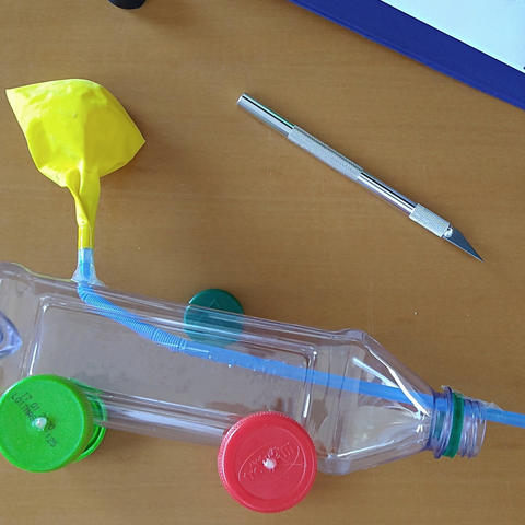 how to make a homemade plastic bottle car by a rubber band 