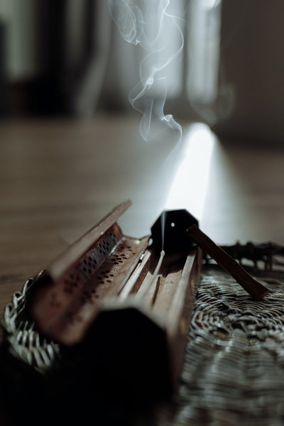 Burning incense inside a holder