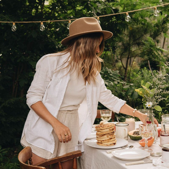 Woman Setting a Table