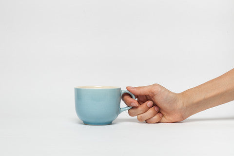 How To Hold Your Coffee Cup Because You're Probably Doing It Wrong