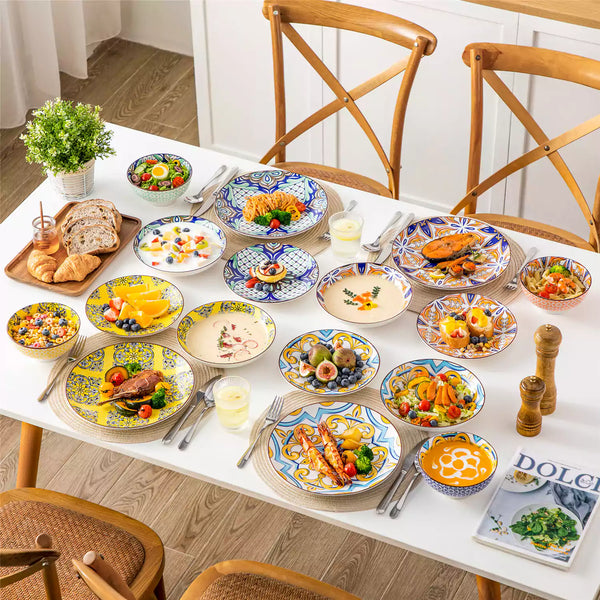 Jasmin 16-piece vibrant bohemian dinnerware set with soup bowls and colorful accents on dining table