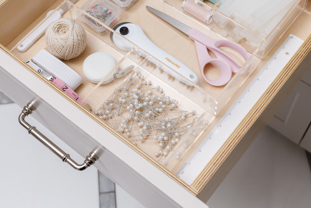 Drawer organizer in the laundry room by Salt by Sabrina.